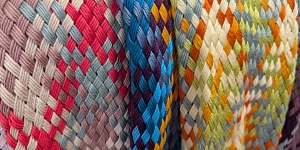 Making woven scarves in a frame