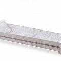 A coffin draped with linen