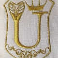 Embroidery with metallic gold threads