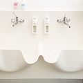 Surgical sink with two stations made of Corian ® material