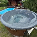 Hot tub with integrated oven and granite top made in Latvia