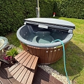 Hot tub with integrated oven and granite top made in Latvia