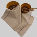 Linen kitchen towel with burgundy and white ribbon